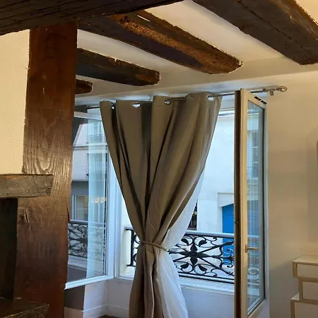 Апартаменты Elegant Retreat By Le Marais Париж